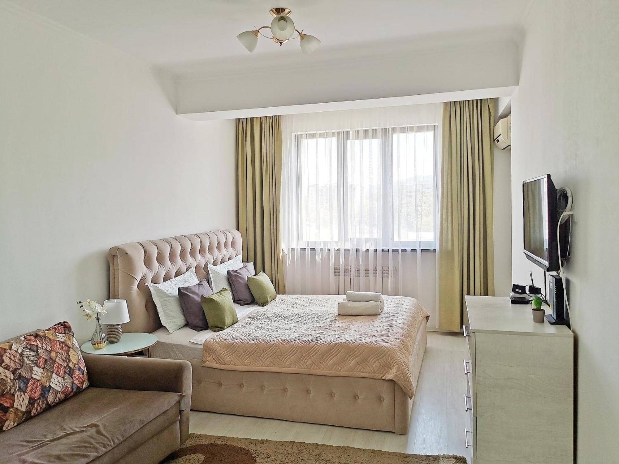 Appartments " Zhetysu-4" Алма Ата Екстериор снимка