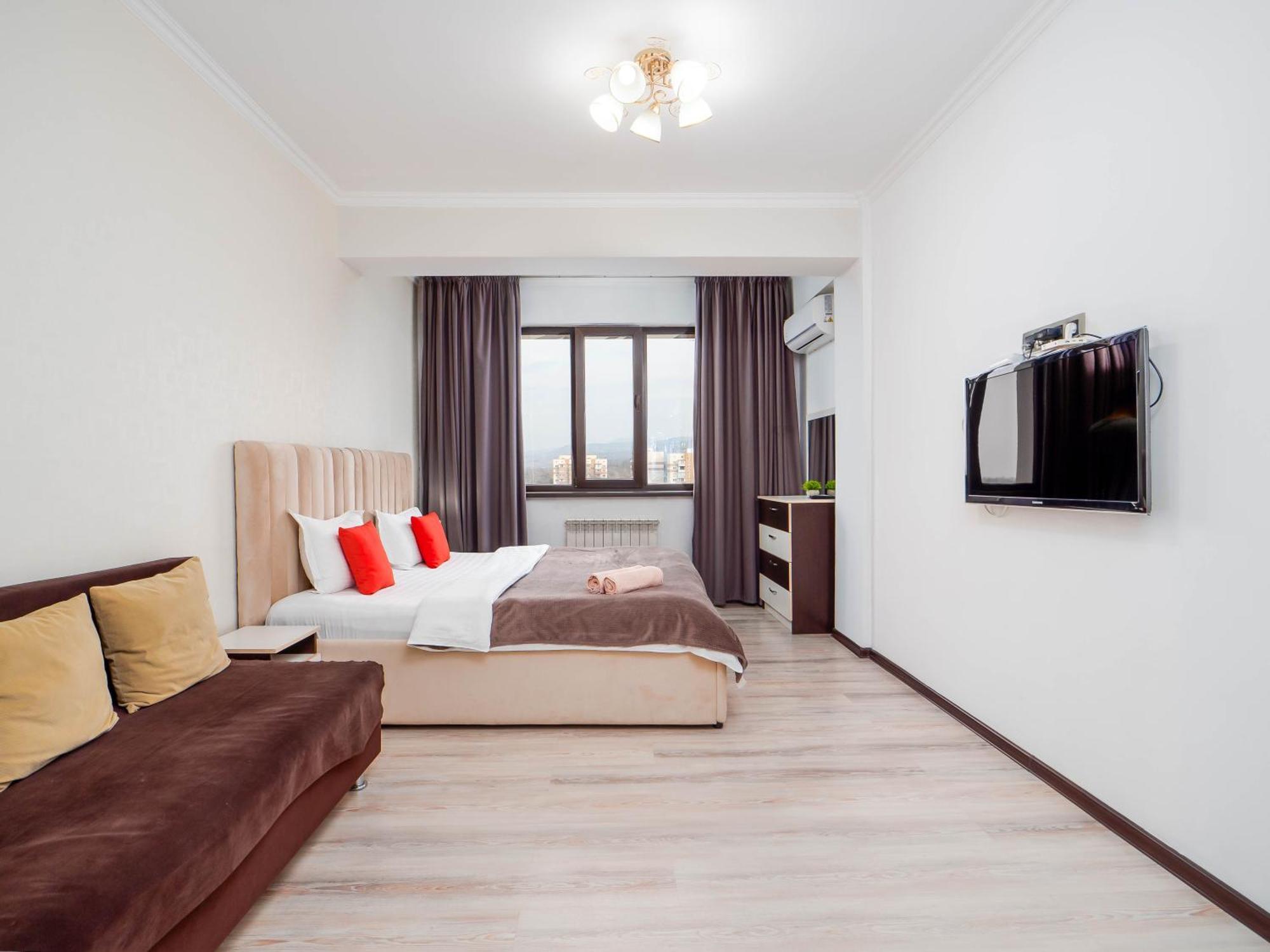 Appartments " Zhetysu-4" Алма Ата Екстериор снимка