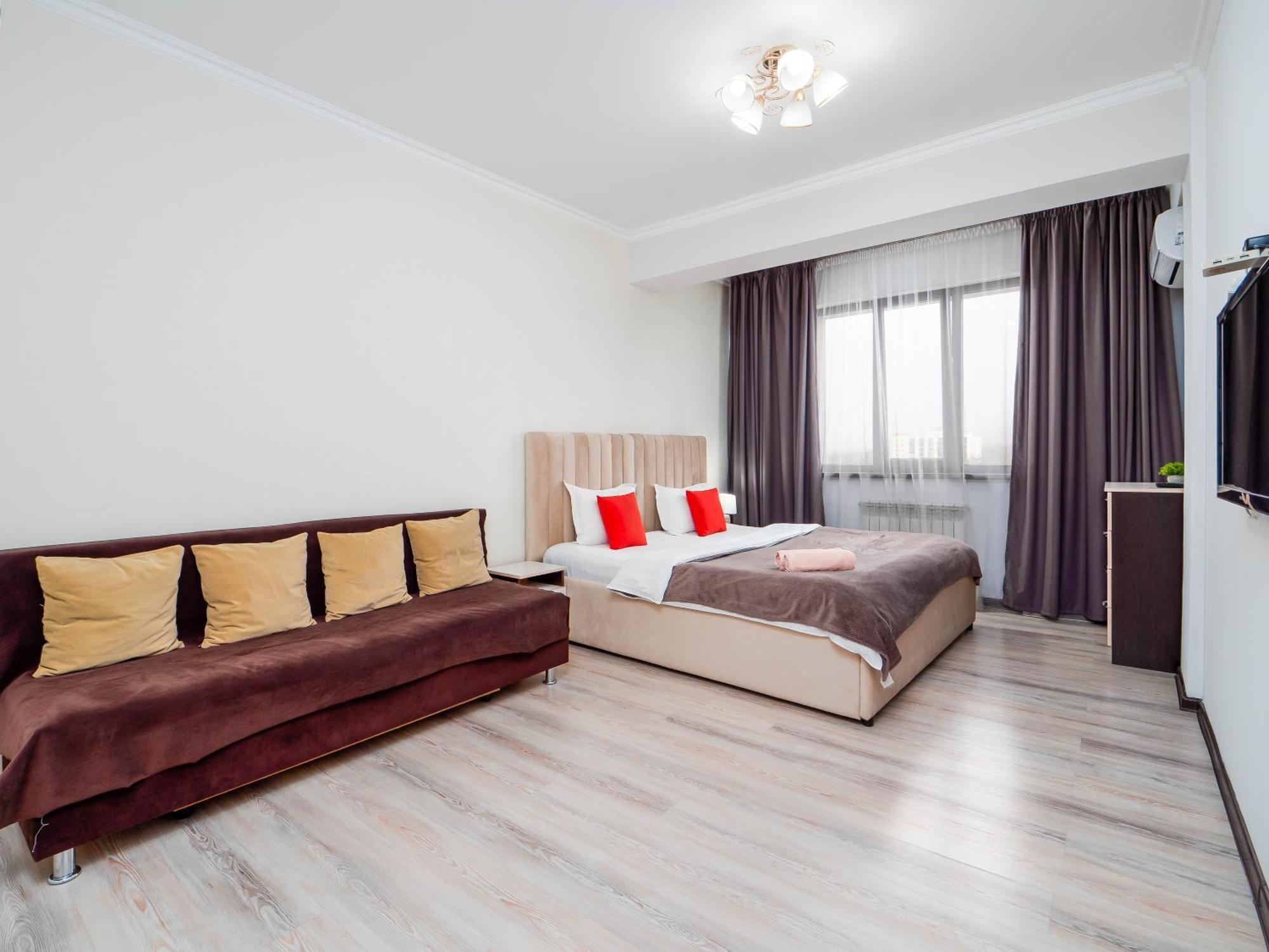 Appartments " Zhetysu-4" Алма Ата Екстериор снимка