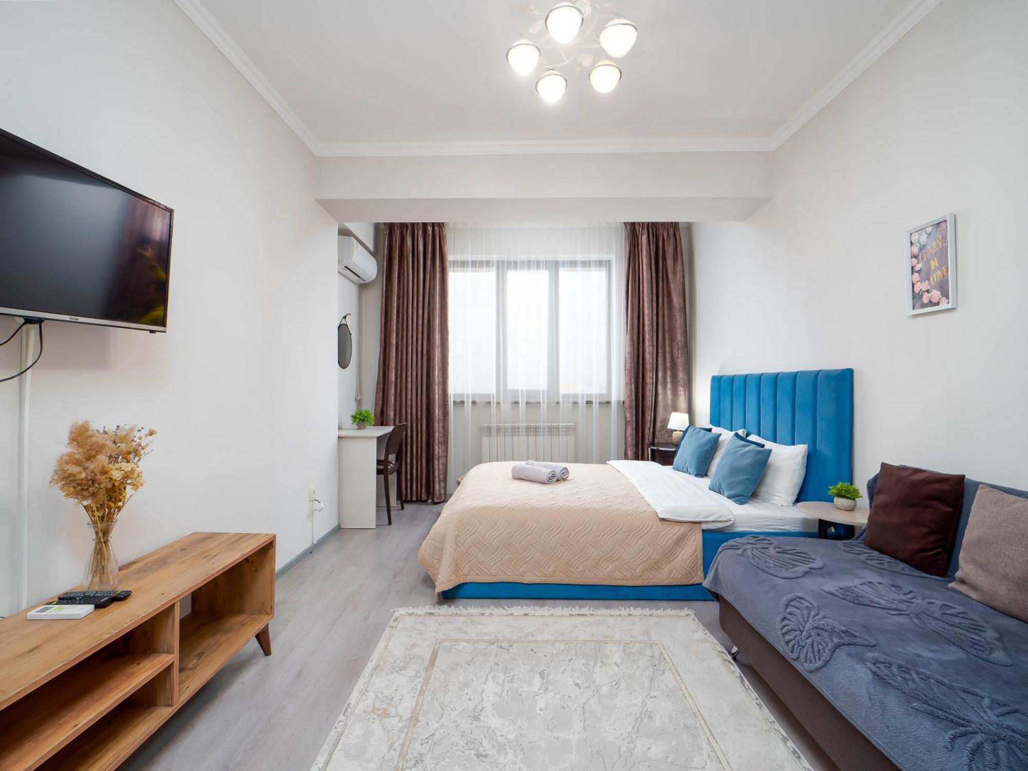 Appartments " Zhetysu-4" Алма Ата Екстериор снимка